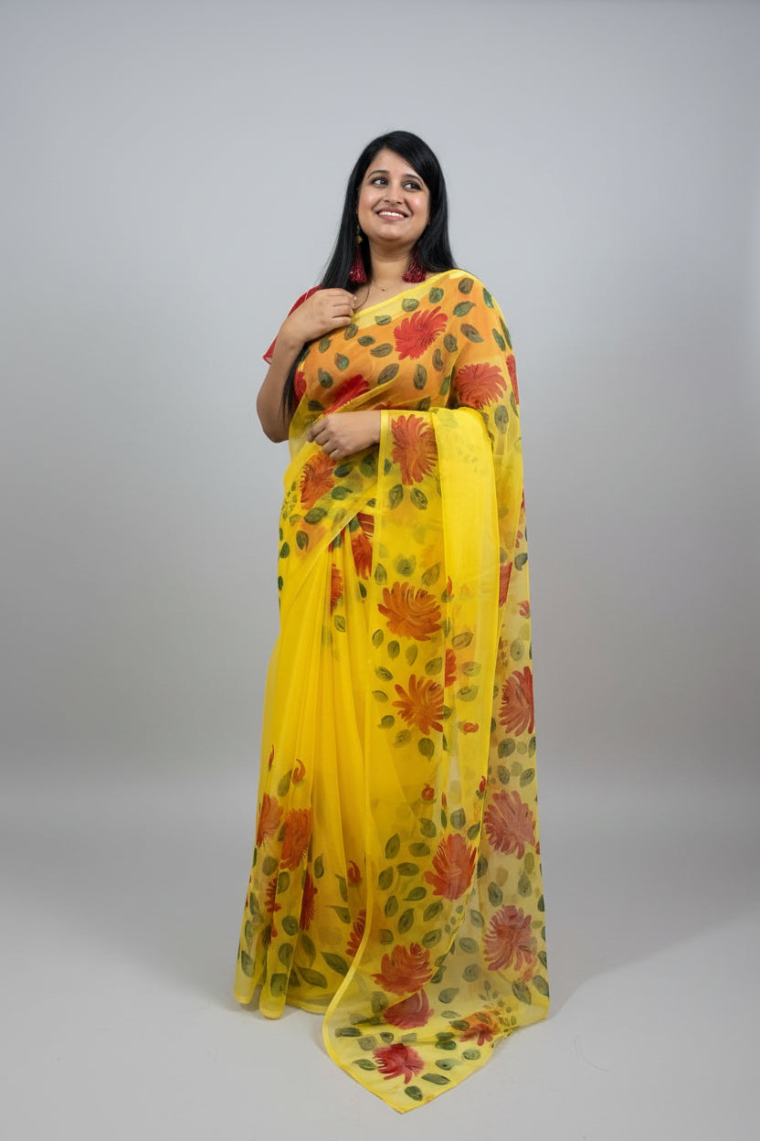Haldi organza handpainted saree