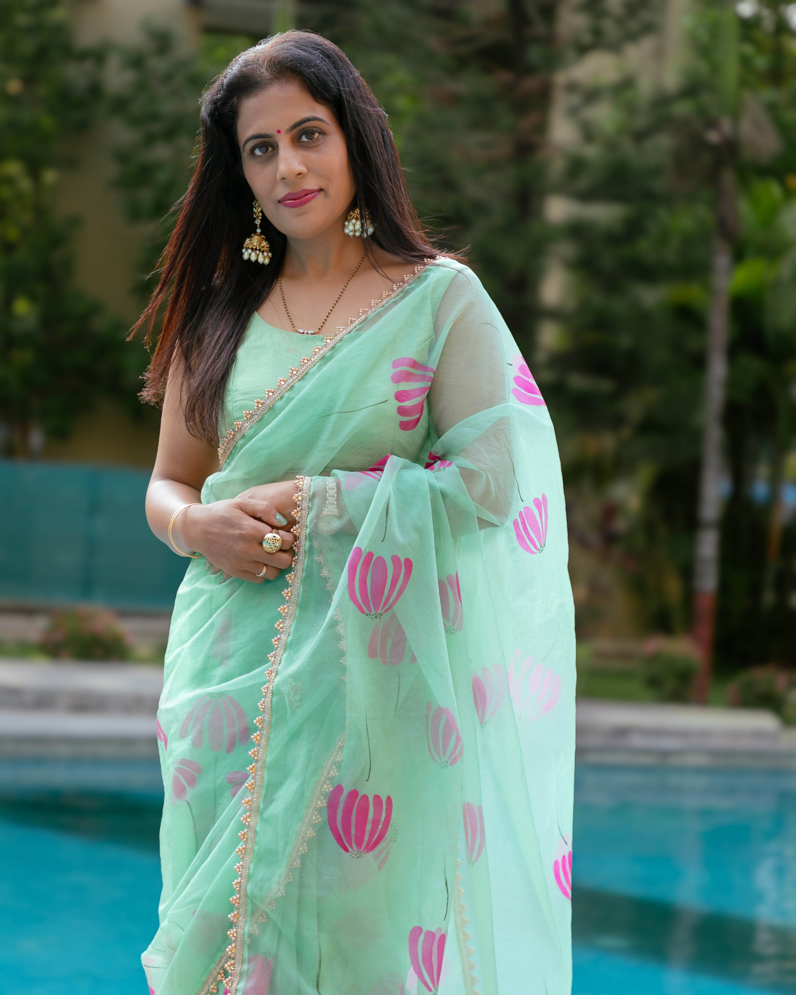 green handpainted organza saree