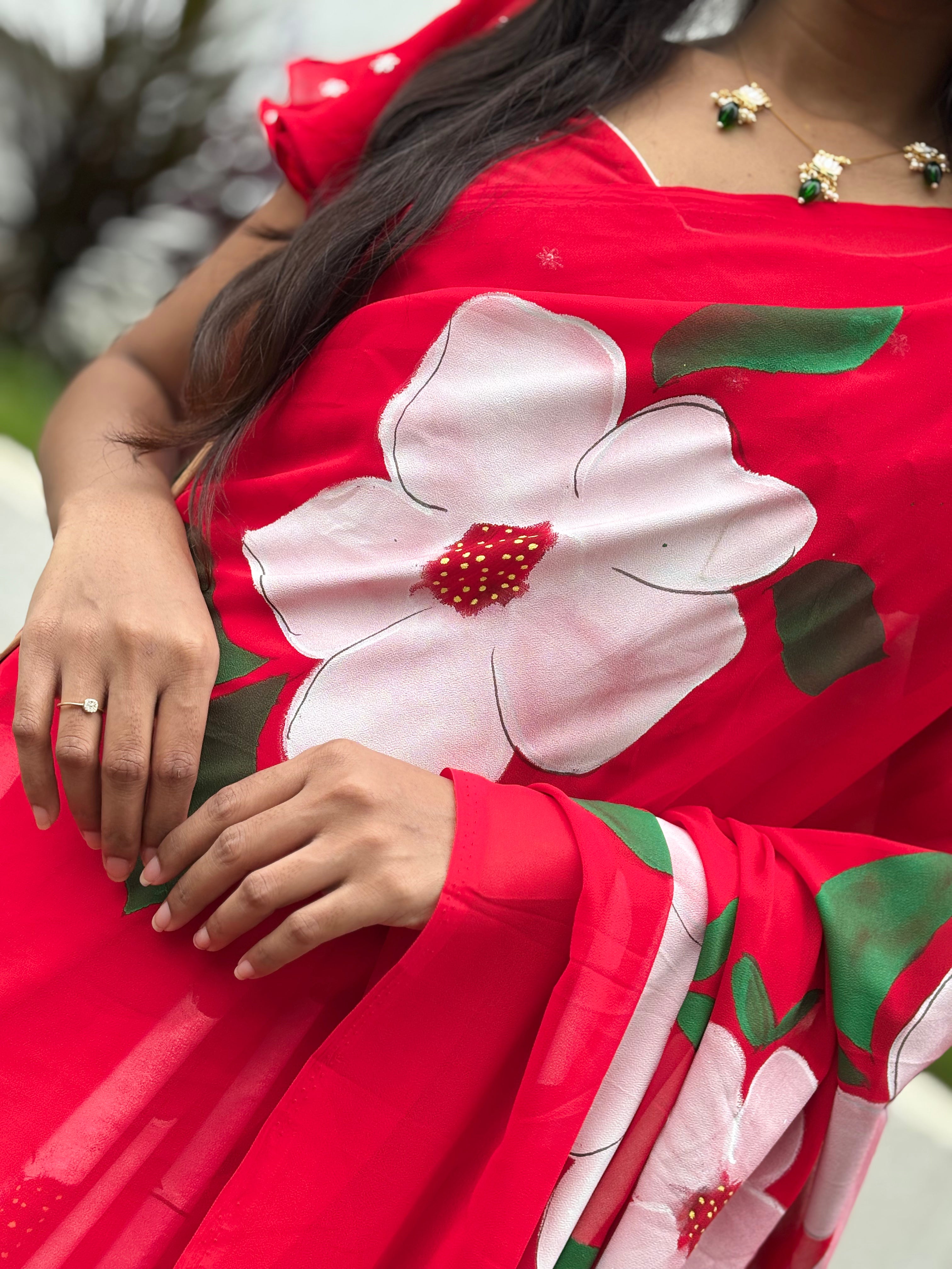 red handpainted georgette saree