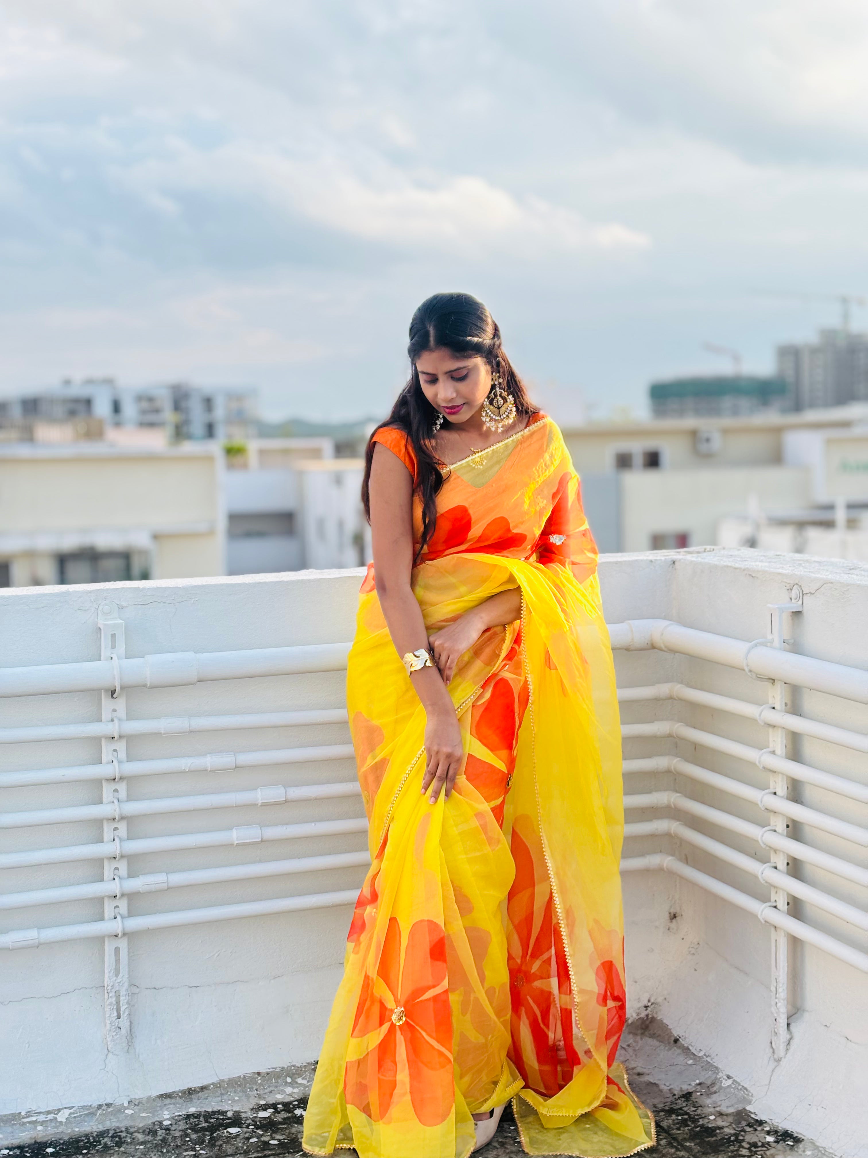 Yellow organza handpainted saree
